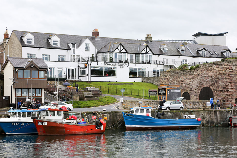 Fishing boats, harbour breeze, and a perfect pint at the Bamburgh Castle Inn.